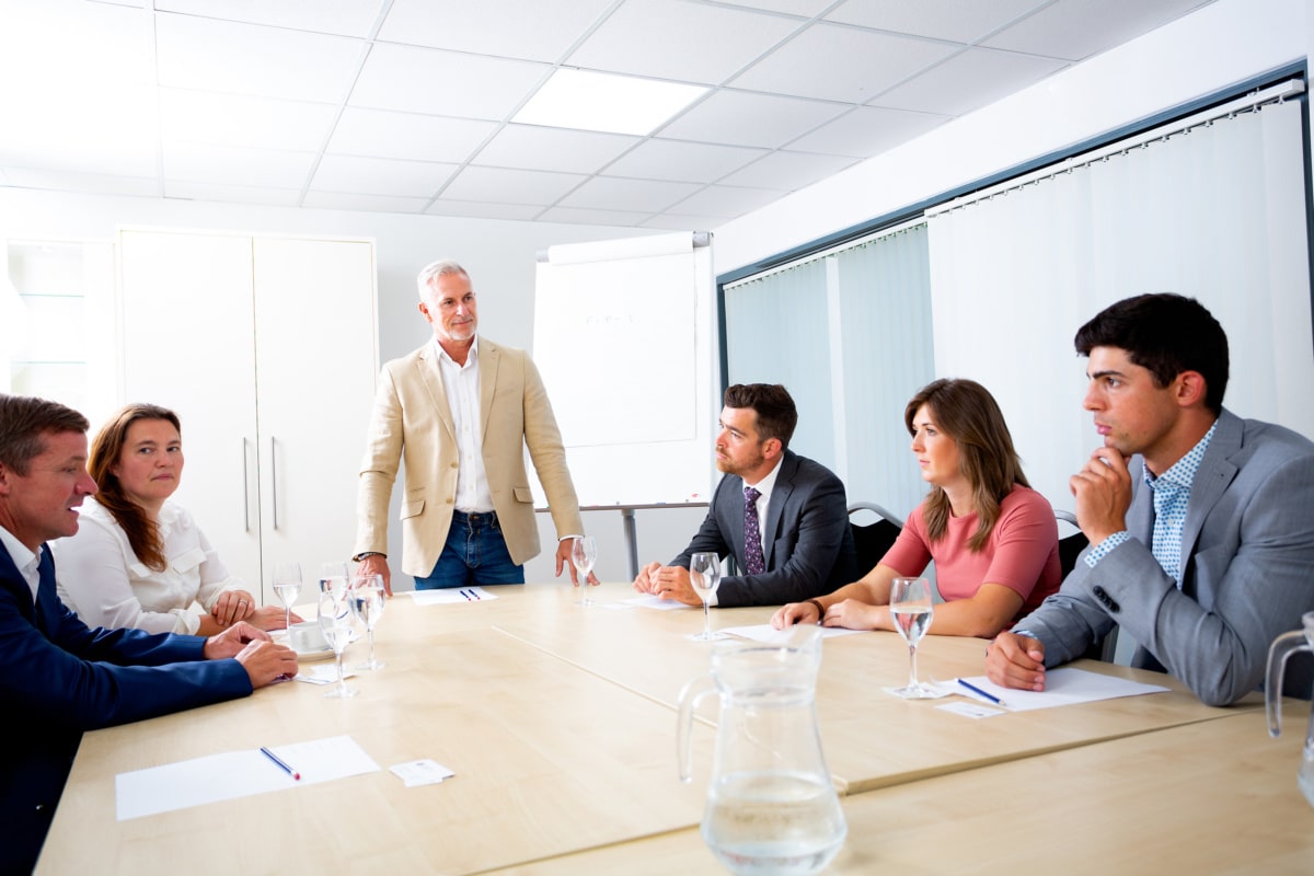 Photo of Phill Toogood delivering a group leadership coaching session
