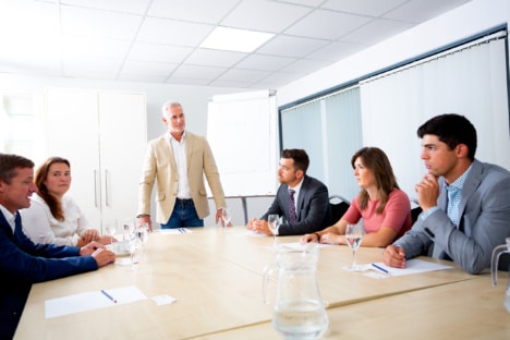 Photo of Phill Toogood delivering a group leadership coaching session